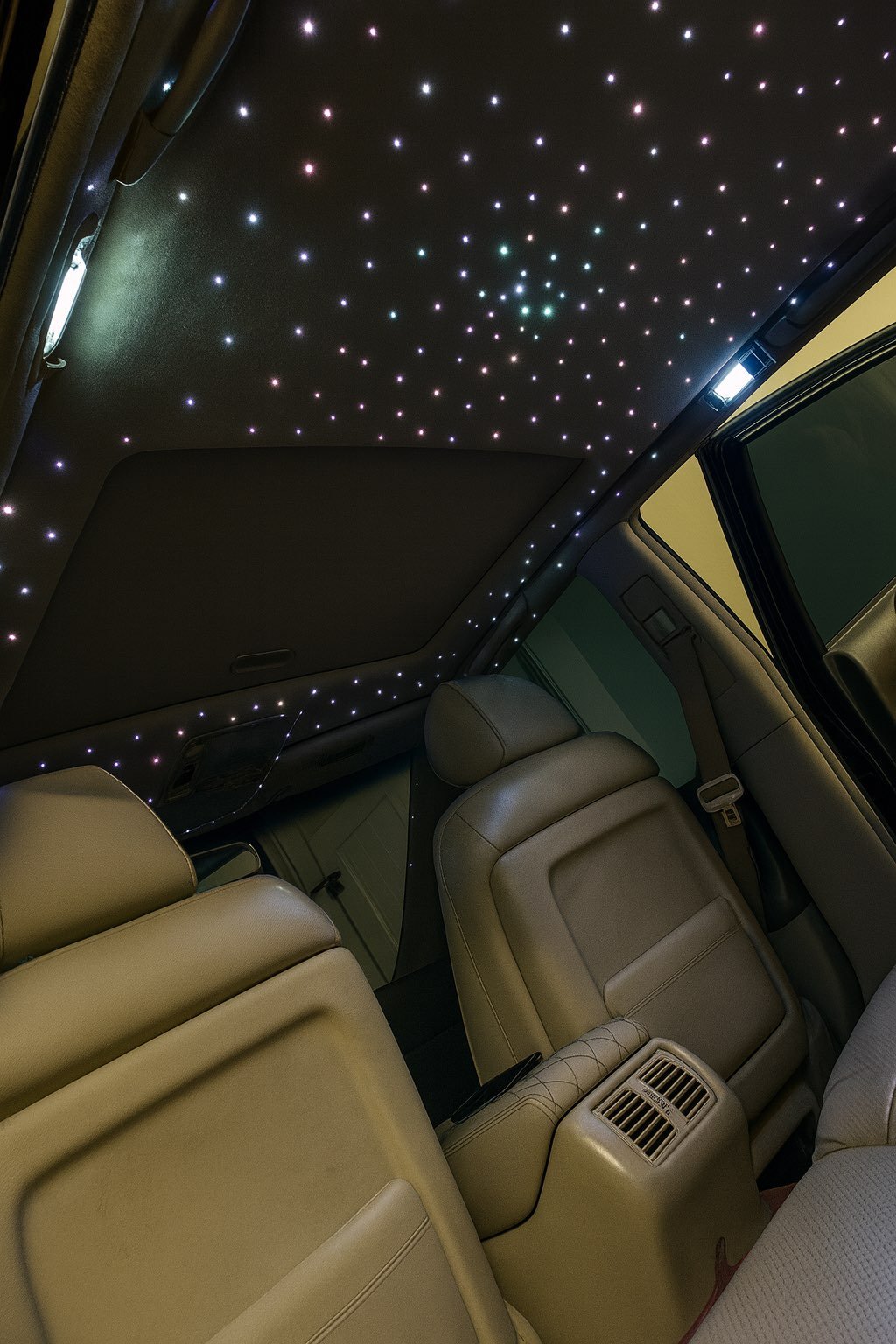 Fiber-optic bundle glowing during headliner install